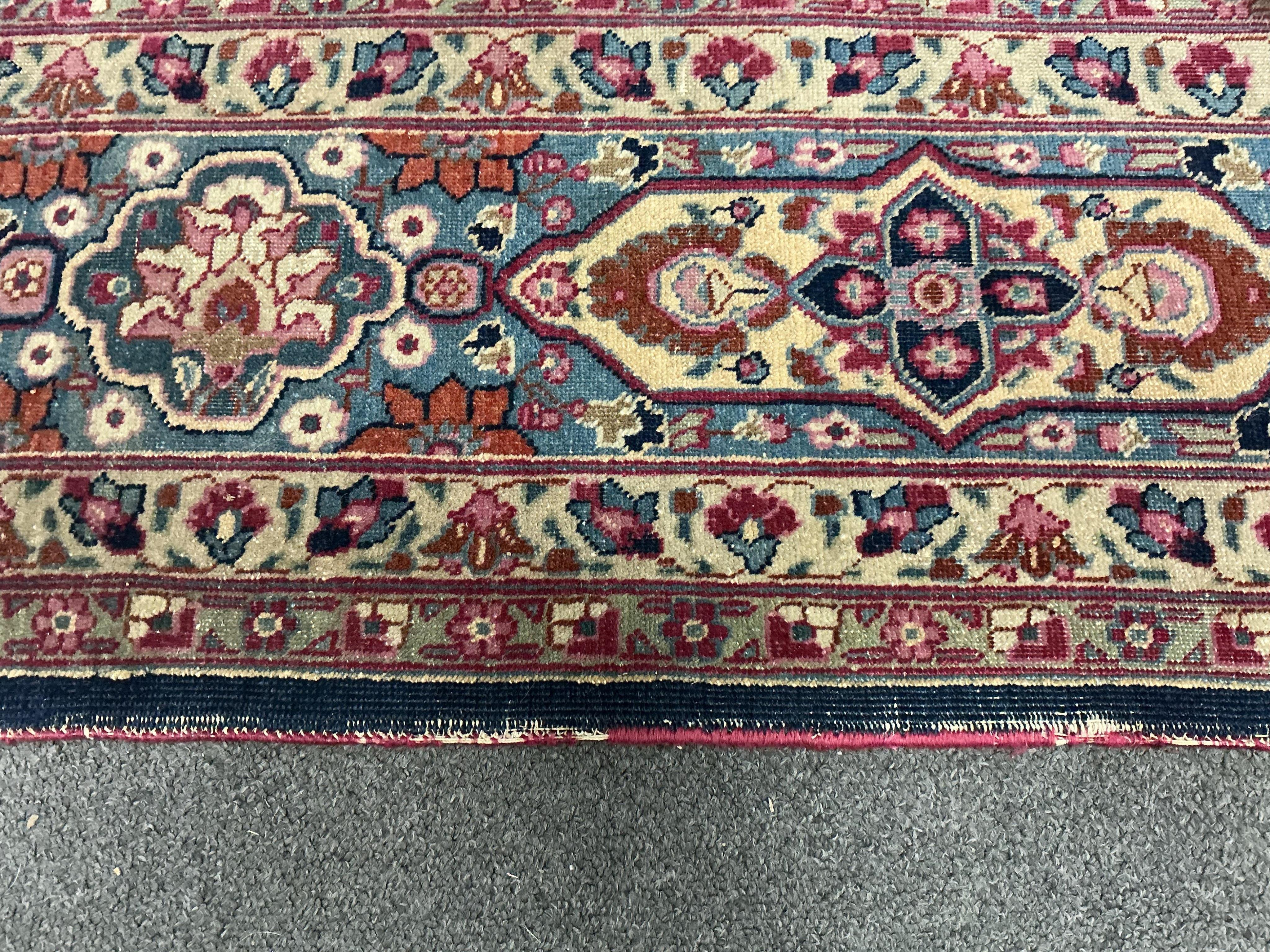 An early 20th century Kashan blue ground carpet, 315 x 206cm